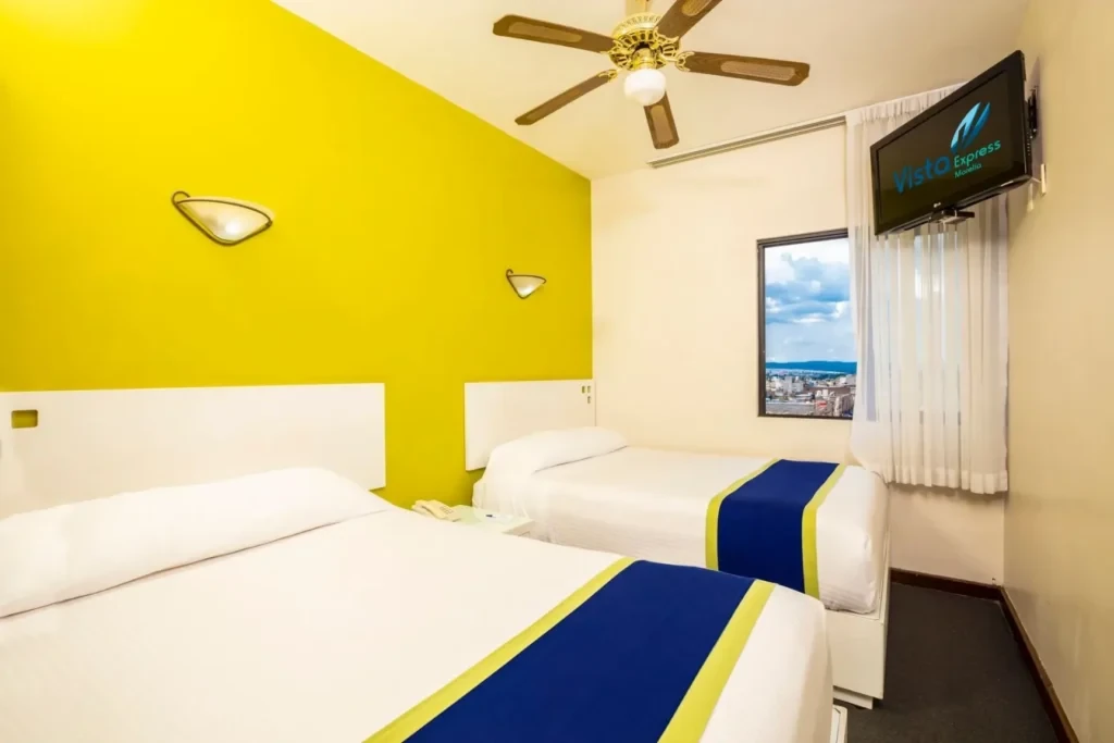 Standard room with three double beds